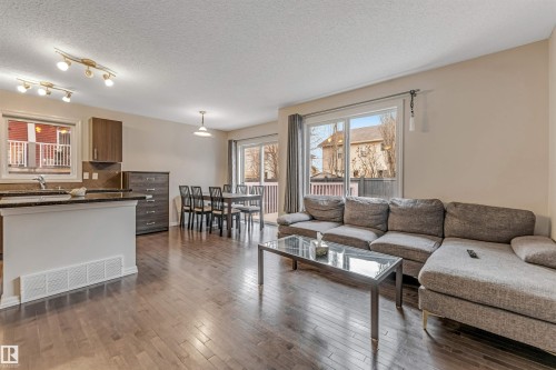 #10 5101 Soleil Bv, Beaumont, AB - Indoor Photo Showing Living Room