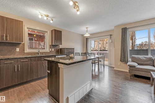 #10 5101 Soleil Bv, Beaumont, AB - Indoor Photo Showing Kitchen