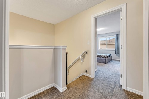 #10 5101 Soleil Bv, Beaumont, AB - Indoor Photo Showing Other Room