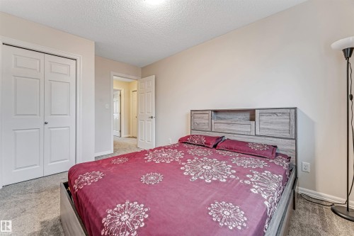 #10 5101 Soleil Bv, Beaumont, AB - Indoor Photo Showing Bedroom