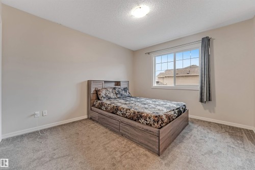 #10 5101 Soleil Bv, Beaumont, AB - Indoor Photo Showing Bedroom