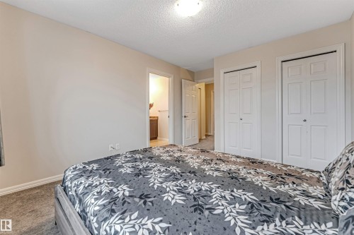 #10 5101 Soleil Bv, Beaumont, AB - Indoor Photo Showing Bedroom