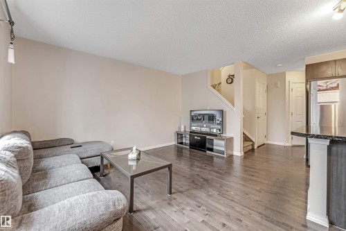 #10 5101 Soleil Bv, Beaumont, AB - Indoor Photo Showing Living Room