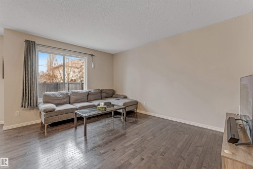 #10 5101 Soleil Bv, Beaumont, AB - Indoor Photo Showing Living Room