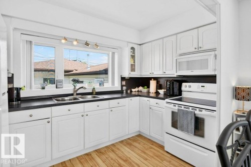 13523 65 Street, Edmonton, AB - Indoor Photo Showing Kitchen With Double Sink