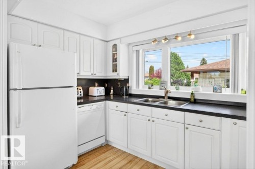 13523 65 Street, Edmonton, AB - Indoor Photo Showing Kitchen With Double Sink