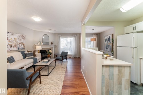 121 Bulyea Road Nw, Edmonton, AB - Indoor Photo Showing Living Room With Fireplace