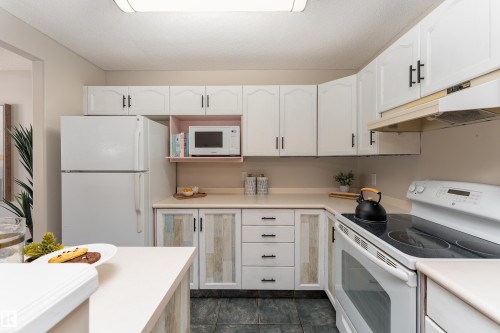 121 Bulyea Road Nw, Edmonton, AB - Indoor Photo Showing Kitchen