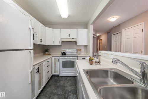 121 Bulyea Road Nw, Edmonton, AB - Indoor Photo Showing Kitchen With Double Sink