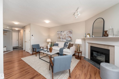 121 Bulyea Road Nw, Edmonton, AB - Indoor Photo Showing Living Room With Fireplace