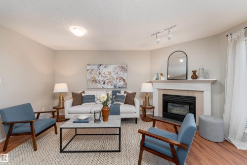 121 Bulyea Road Nw, Edmonton, AB - Indoor Photo Showing Living Room With Fireplace