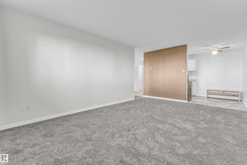 #105 10725 111St Nw, Edmonton, AB - Indoor Photo Showing Other Room