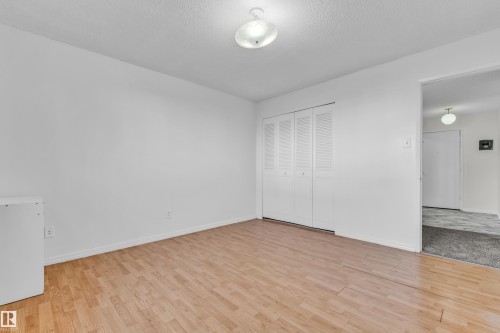 #105 10725 111St Nw, Edmonton, AB - Indoor Photo Showing Other Room