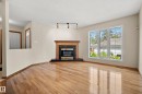 10014 97 Avenue Nw, Edmonton, AB  - Indoor Photo Showing Living Room With Fireplace 