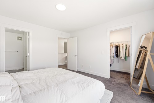 1323 Erker Crescent Nw, Edmonton, AB - Indoor Photo Showing Bedroom