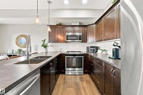 #117 7293 South Terwillegar Dr Nw, Edmonton, AB - Indoor Photo Showing Kitchen With Stainless Steel Kitchen With Double Sink With Upgraded Kitchen