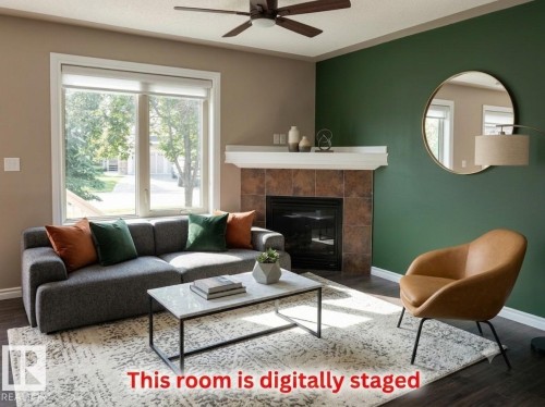 #133 5420 Grant Macewan Bv, Leduc, AB - Indoor Photo Showing Living Room With Fireplace