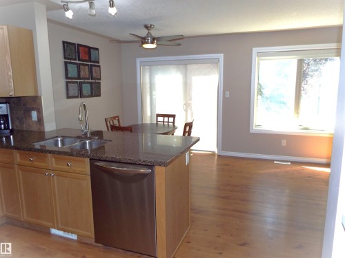 #133 5420 Grant Macewan Bv, Leduc, AB - Indoor Photo Showing Kitchen With Double Sink