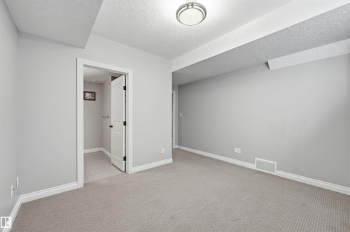 831 Hollands Landing Nw, Edmonton, AB - Indoor Photo Showing Other Room