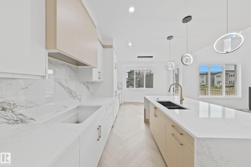 8916 Mayday Way Sw, Edmonton, AB - Indoor Photo Showing Kitchen With Double Sink