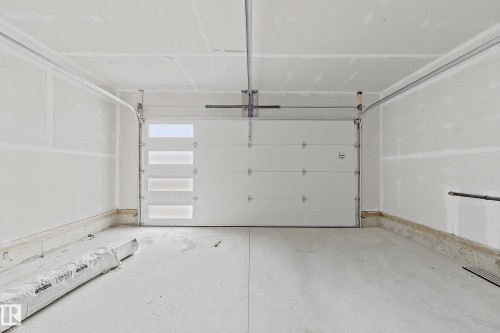 8916 Mayday Way Sw, Edmonton, AB - Indoor Photo Showing Garage