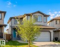 Two-story residential property featuring a light gray siding exterior with dark trim - 1919 Hammond Place, Edmonton, AB  - Outdoor 