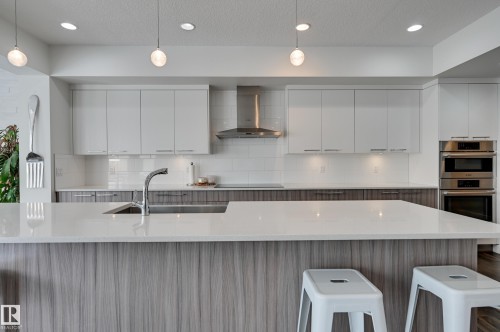 1311 Hainstock Way Sw, Edmonton, AB - Indoor Photo Showing Kitchen With Upgraded Kitchen
