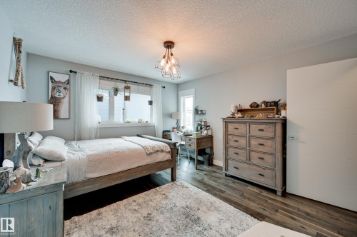 1311 Hainstock Way Sw, Edmonton, AB - Indoor Photo Showing Bedroom