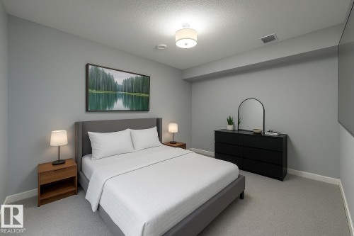 1311 Hainstock Way Sw, Edmonton, AB - Indoor Photo Showing Bedroom