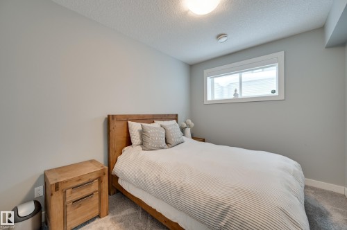 1311 Hainstock Way Sw, Edmonton, AB - Indoor Photo Showing Bedroom