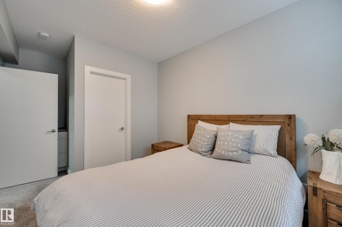 1311 Hainstock Way Sw, Edmonton, AB - Indoor Photo Showing Bedroom