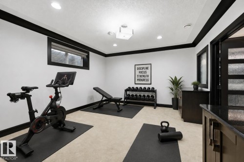 5216 Mullen Crest Nw, Edmonton, AB - Indoor Photo Showing Gym Room