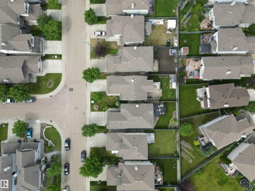 Aerial perspective of a residential community featuring a network of streets and uniform lot sizes - 1820 Robertson Crescent Sw, Edmonton, AB - 