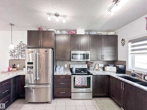 #11 150 Everitt Dr, St. Albert, AB - Indoor Photo Showing Kitchen With Double Sink With Upgraded Kitchen
