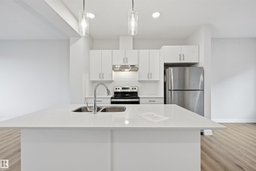 #38 1010 Rabbit Hill Rd Sw, Edmonton, AB - Indoor Photo Showing Kitchen With Stainless Steel Kitchen With Double Sink With Upgraded Kitchen