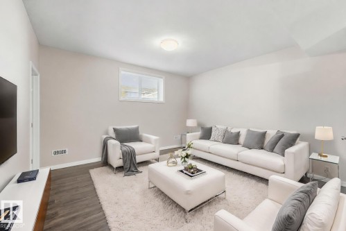 (virtually staged furniture) - 3528 Claxton Crescent Sw, Edmonton, AB - Indoor Photo Showing Living Room