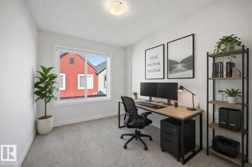 virtually staged - #85 1010 Rabbit Hill Rd Sw, Edmonton, AB - Indoor Photo Showing Office
