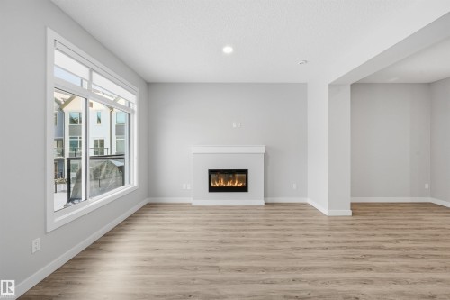 #80 1010 Rabbit Hill Rd Sw, Edmonton, AB - Indoor With Fireplace