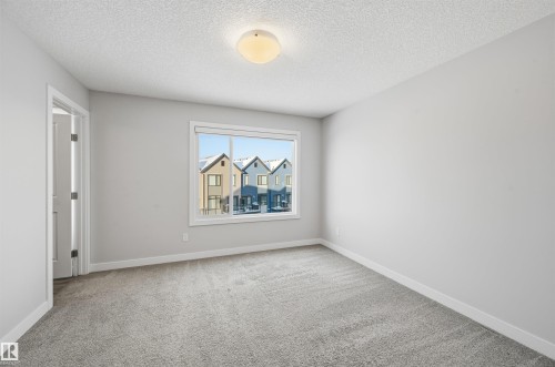 #80 1010 Rabbit Hill Rd Sw, Edmonton, AB - Indoor Photo Showing Other Room