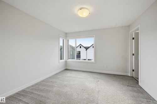 #77 1010 Rabbit Hill Rd Sw, Edmonton, AB - Indoor Photo Showing Other Room