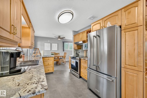 6716 101A Avenue Nw, Edmonton, AB - Indoor Photo Showing Kitchen With Double Sink