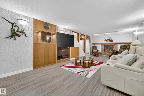 6716 101A Avenue Nw, Edmonton, AB - Indoor Photo Showing Living Room With Fireplace