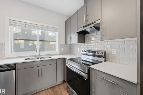#54 804 Welsh Dr Sw, Edmonton, AB - Indoor Photo Showing Kitchen With Stainless Steel Kitchen With Double Sink