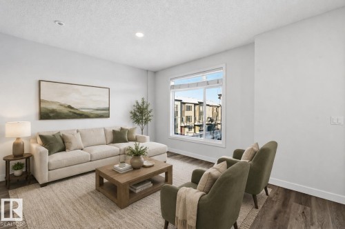 #54 804 Welsh Dr Sw, Edmonton, AB - Indoor Photo Showing Living Room