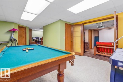 Recreation room featuring a classic billiards table, carpet flooring, and recessed lighting - 16 Harrold Place, St. Albert, AB - Indoor Photo Showing Other Room