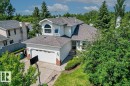 Two-story residence featuring white vinyl siding and a gabled roofline - 16 Harrold Place, St. Albert, AB  - Outdoor 