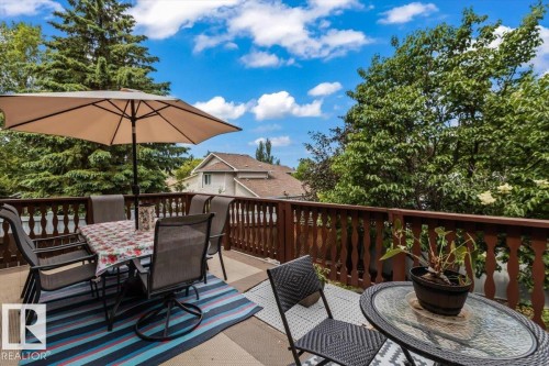 Expansive outdoor deck space featuring wood railings and a composite surface - 16 Harrold Place, St. Albert, AB - Outdoor