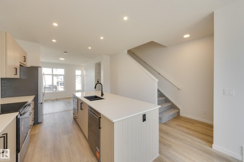 21007 25 Avenue Nw, Edmonton, AB - Indoor Photo Showing Kitchen With Double Sink With Upgraded Kitchen