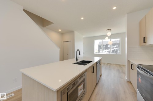 21007 25 Avenue Nw, Edmonton, AB - Indoor Photo Showing Kitchen With Double Sink