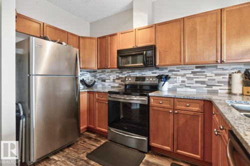#313 226 Macewan Rd Sw, Edmonton, AB - Indoor Photo Showing Kitchen With Stainless Steel Kitchen
